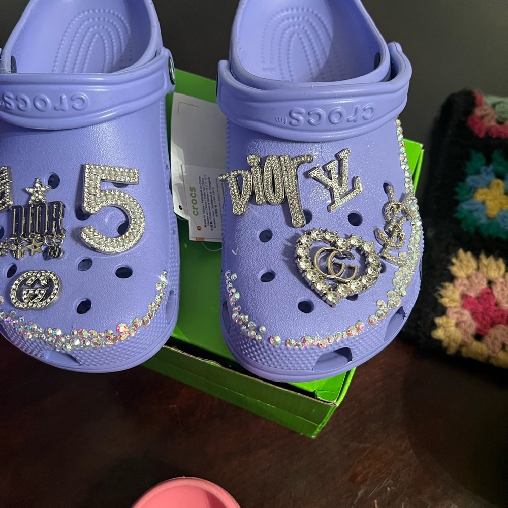We decorate crocs and also sell charms $5 for charms